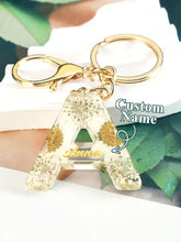 Load image into Gallery viewer, Personalized Beige Dried Flower Letter Keychain – Custom Initial Bag Charm