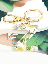 Load image into Gallery viewer, Personalized Beige Dried Flower Letter Keychain – Custom Initial Bag Charm