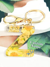 Load image into Gallery viewer, Personalized Name Light Yellow Dried Flower Letter Keychain – Custom Alphabet Bag Charm