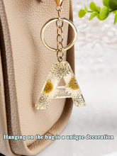 Load image into Gallery viewer, Personalized Beige Dried Flower Letter Keychain – Custom Initial Bag Charm
