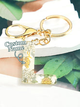 Load image into Gallery viewer, Personalized Beige Dried Flower Letter Keychain – Custom Initial Bag Charm
