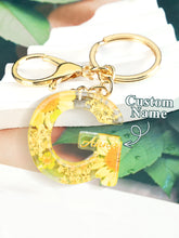 Load image into Gallery viewer, Personalized Name Light Yellow Dried Flower Letter Keychain – Custom Alphabet Bag Charm
