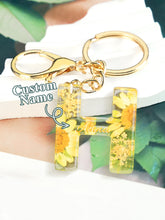 Load image into Gallery viewer, Personalized Name Light Yellow Dried Flower Letter Keychain – Custom Alphabet Bag Charm
